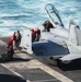 Sailors Perform Maintenance on an F/A-18F Super Hornet