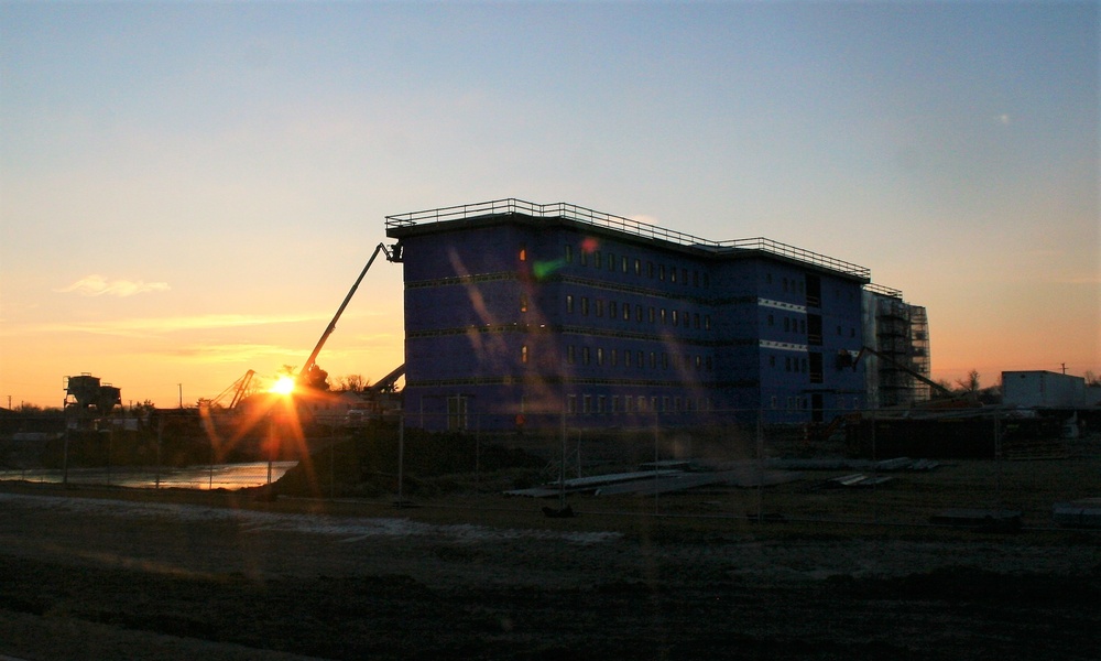 Construction on new barracks continues at sunrise at Fort McCoy