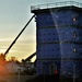 Construction on new barracks continues at sunrise at Fort McCoy