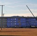 Construction on new barracks continues at sunrise at Fort McCoy