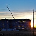 Sun sets next to new barracks at Fort McCoy