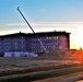 Sun sets next to new barracks at Fort McCoy