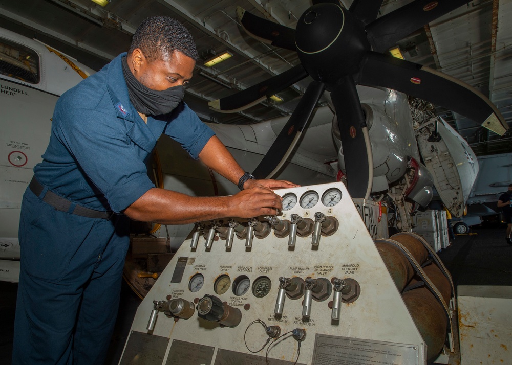 Sailor Conducts Maintenance