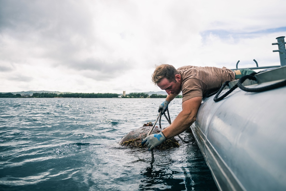 Navy Seabee Divers Repair Bouy in Guam Harbor