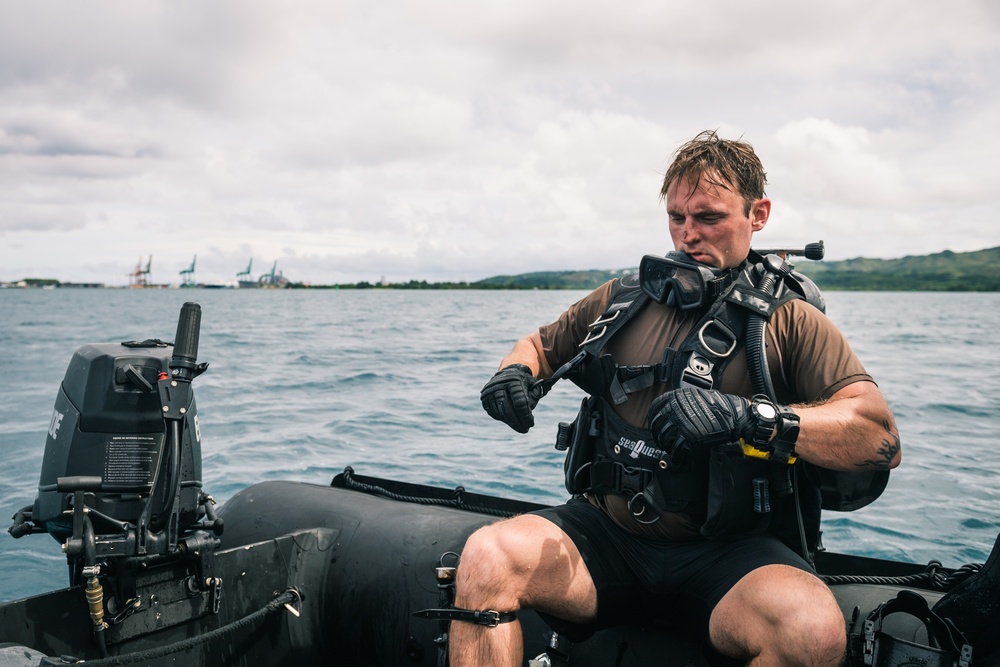 Navy Seabee Divers Repair Bouy in Guam Harbor