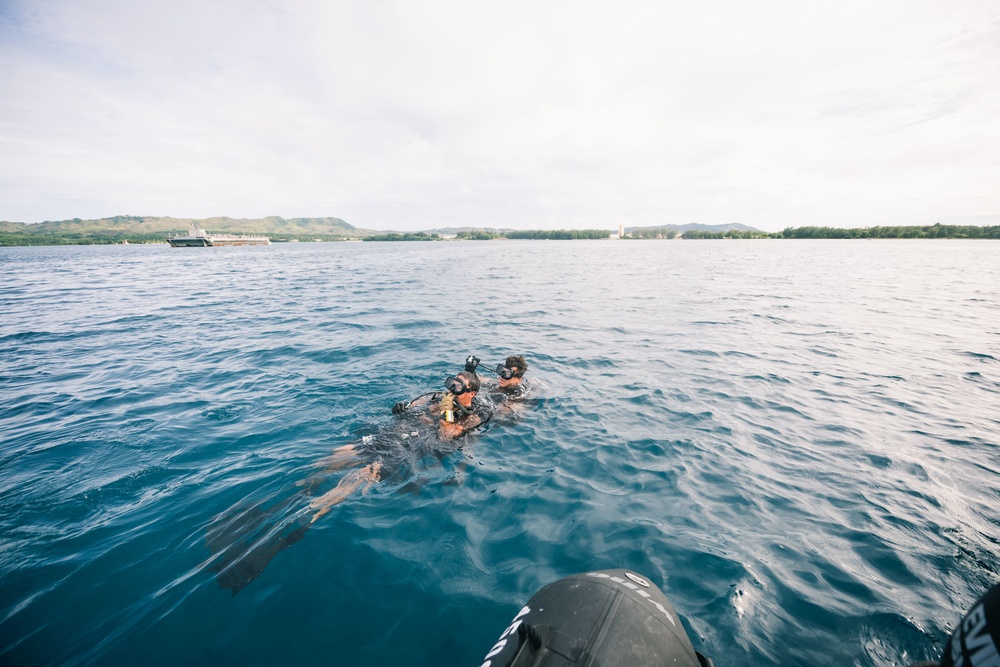 Navy Seabee Divers Repair Bouy in Guam Harbor