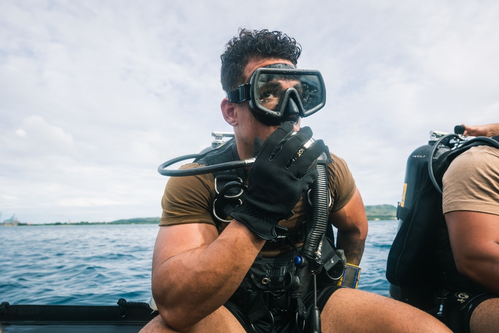 Navy Seabee Divers Repair Bouy in Guam Harbor