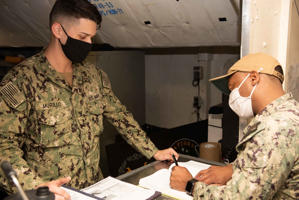 Sailors work