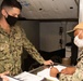 Sailors work