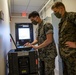 Task force US Marines set up communications equipment in Honduras