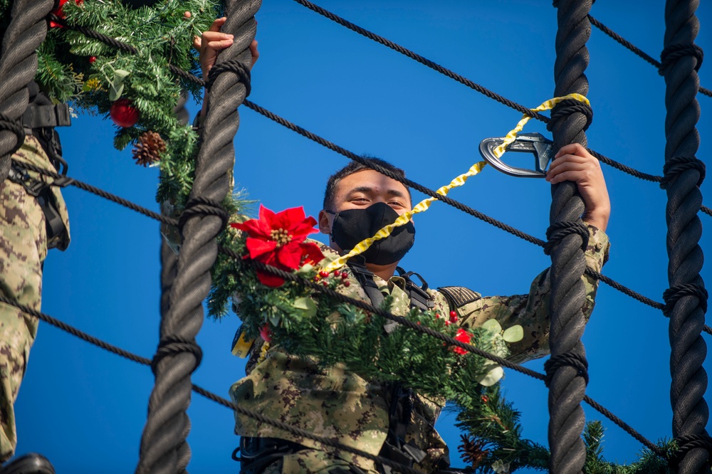 USS Constitution Sailors decorate for the holidays