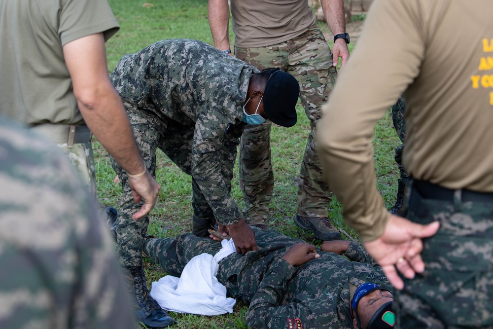 USAF Special Tactics operators share field medical care with Honduran soldiers