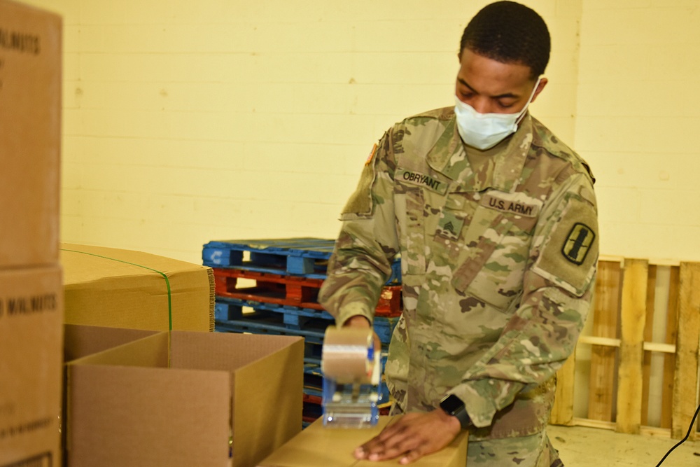 Michigan’s Task Force Spartan work with Forgotten Harvest of Royal Oak