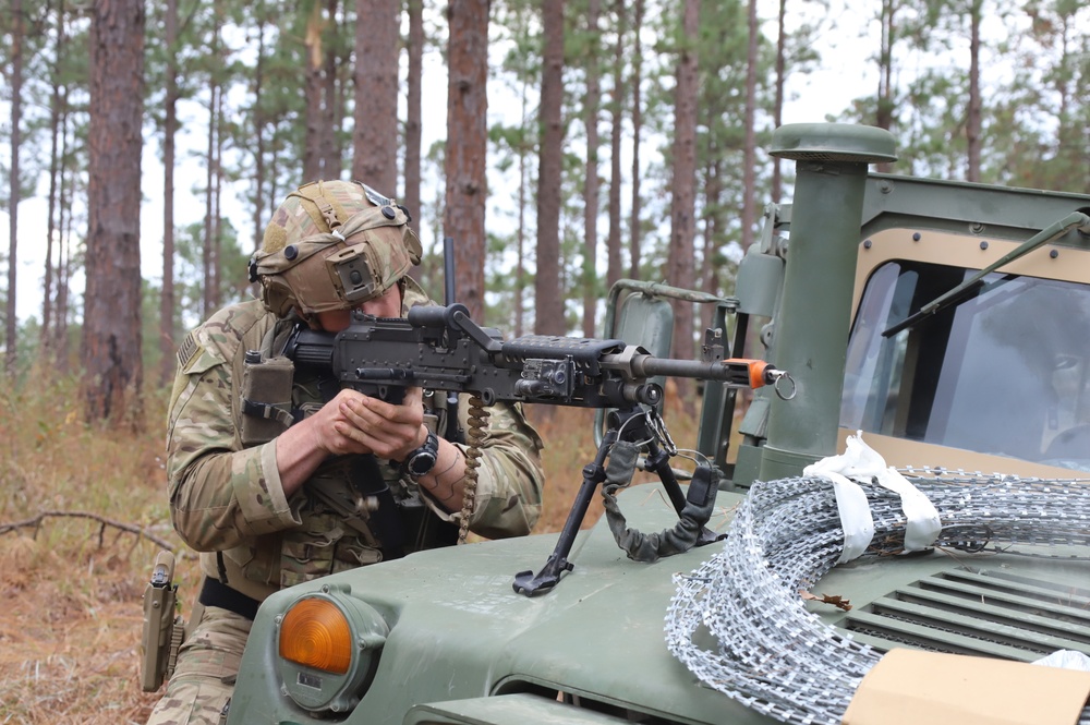 5th SFAB Soldier pulls security from Humvee at JRTC