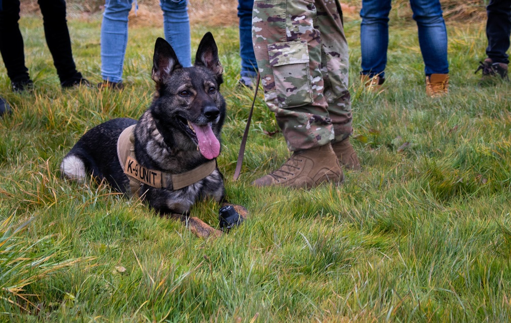 K-9 handler gives working dog demonstration for Kosovo students