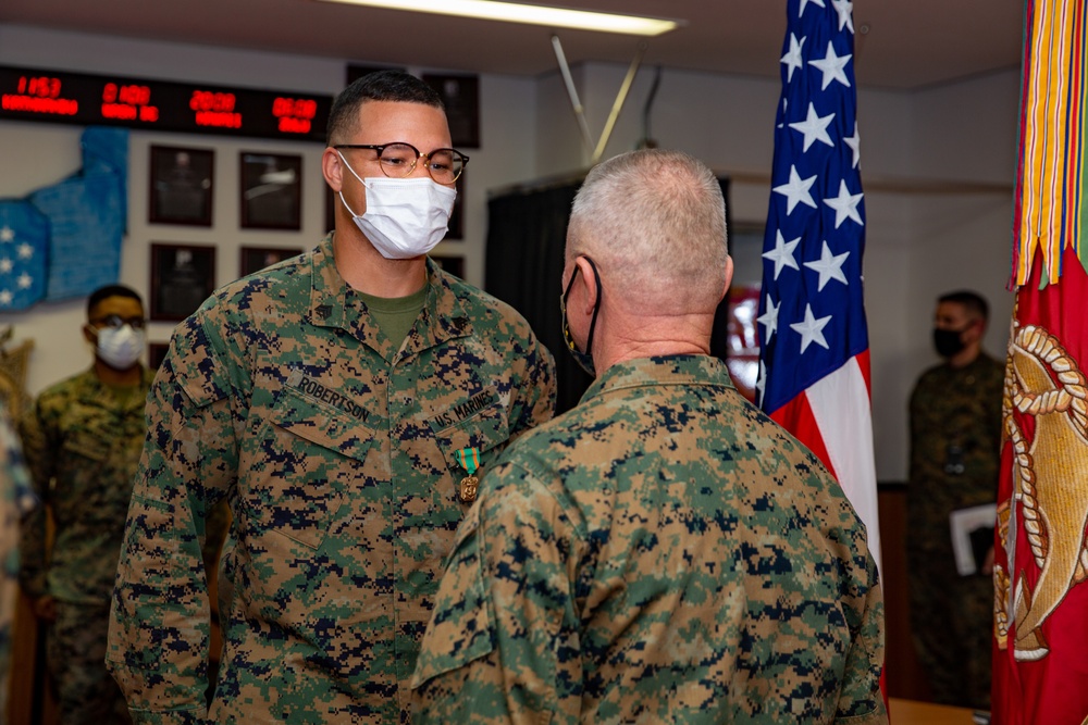 U.S. Marines Receive Navy-Marine Corps Achievement Medal