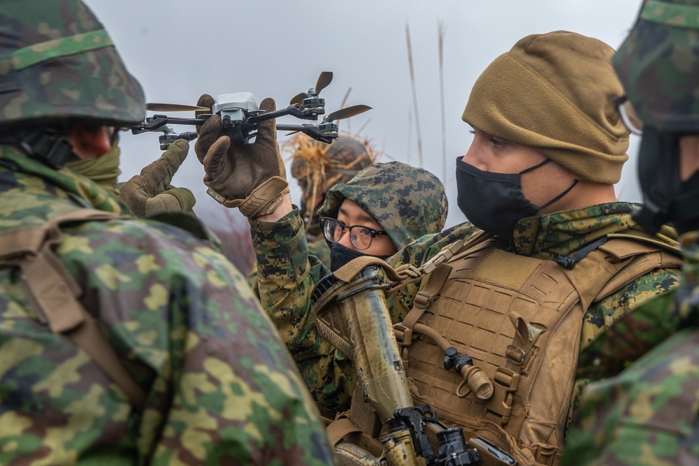 3/8 Marines and JGSDF troops exchange combat tactics during Forest Light 21