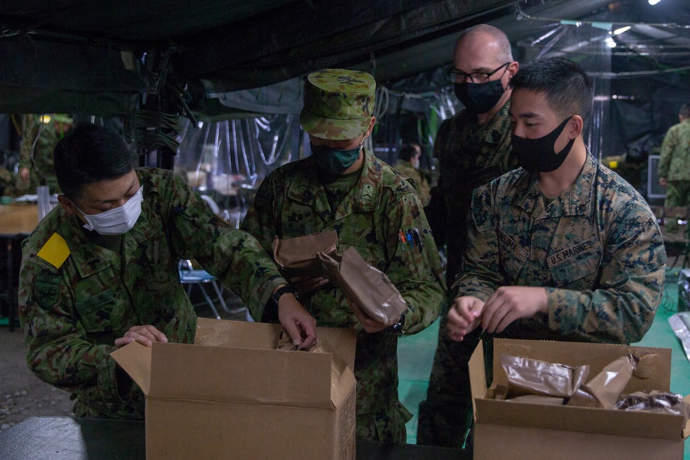 Marines with 3/8 exchange rations during Forest Light 21