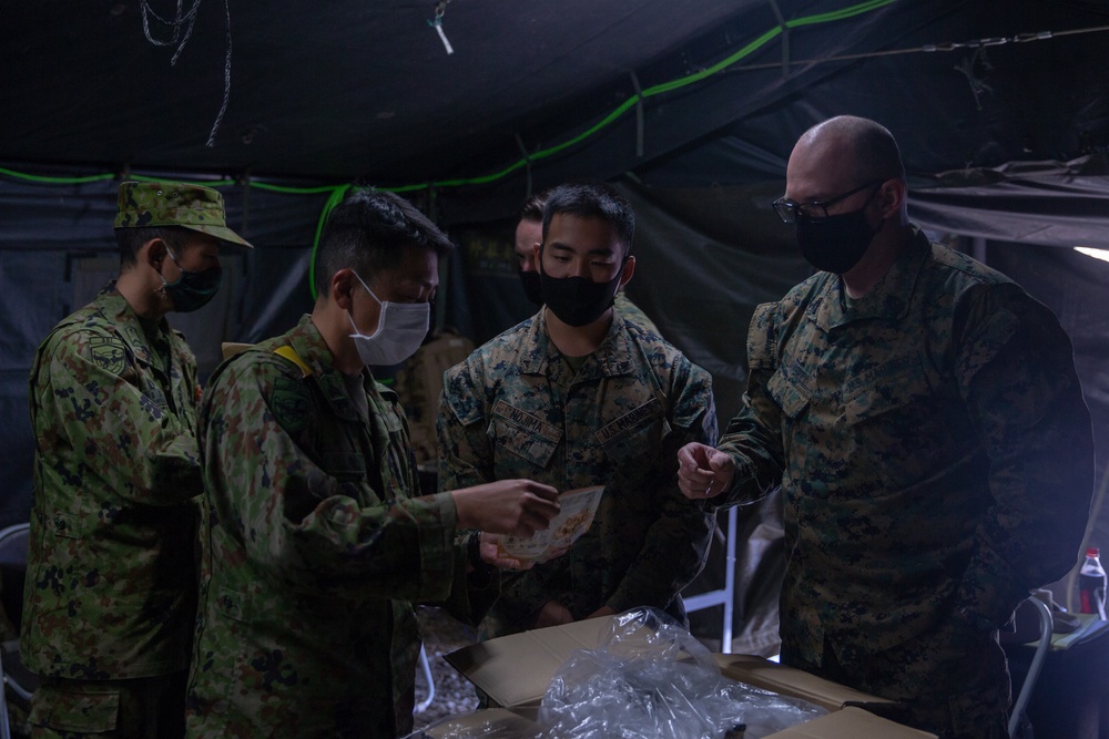 Marines with 3/8 exchange rations during Forest Light 21