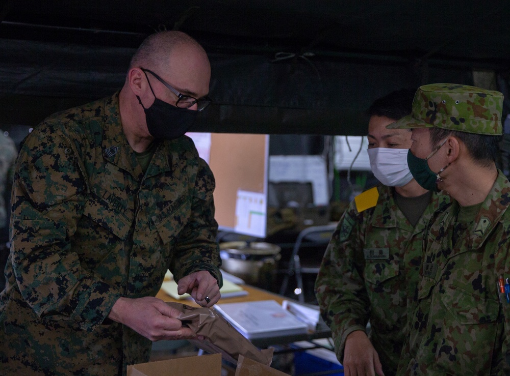 Marines with 3/8 exchange rations during Forest Light 21
