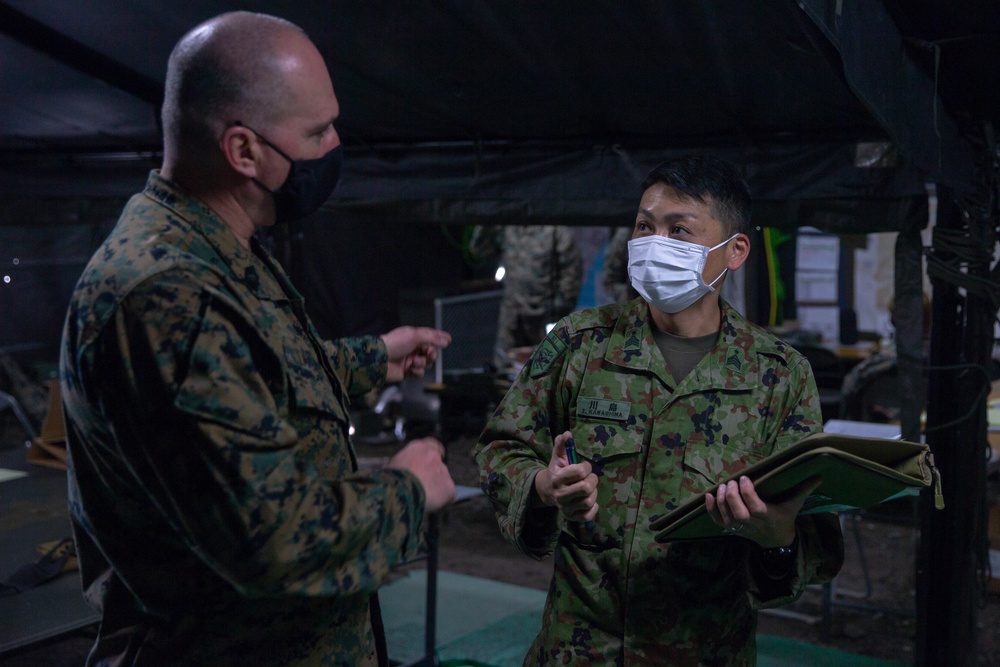 Marines with 3/8 and JGSDF Personnel operate network communications during Forest Light 21