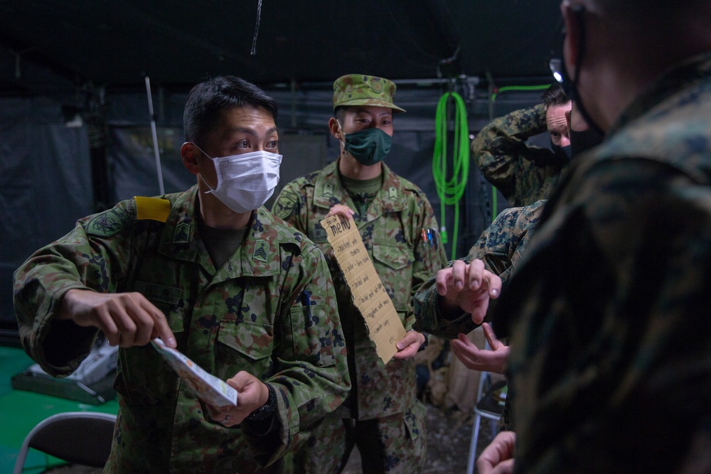 Marines with 3/8 exchange rations during Forest Light 21