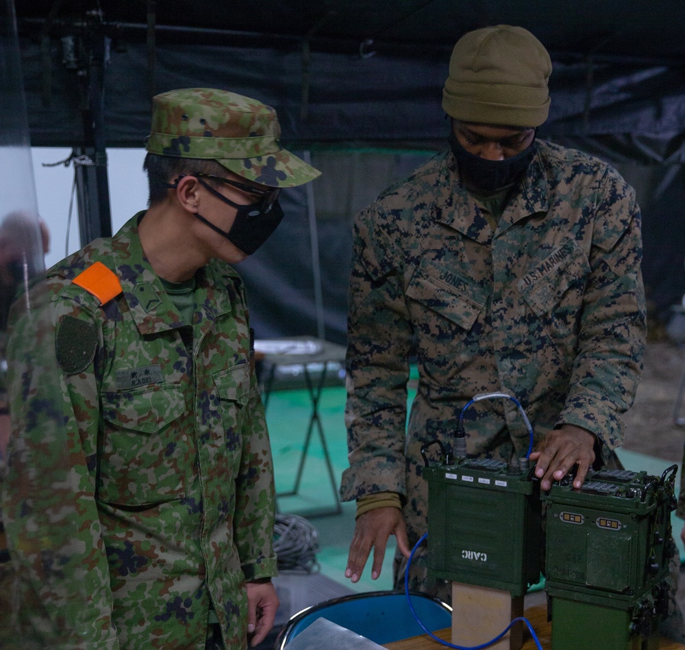Marines with 3/8 and JGSDF Personnel operate network communications during Forest Light 21