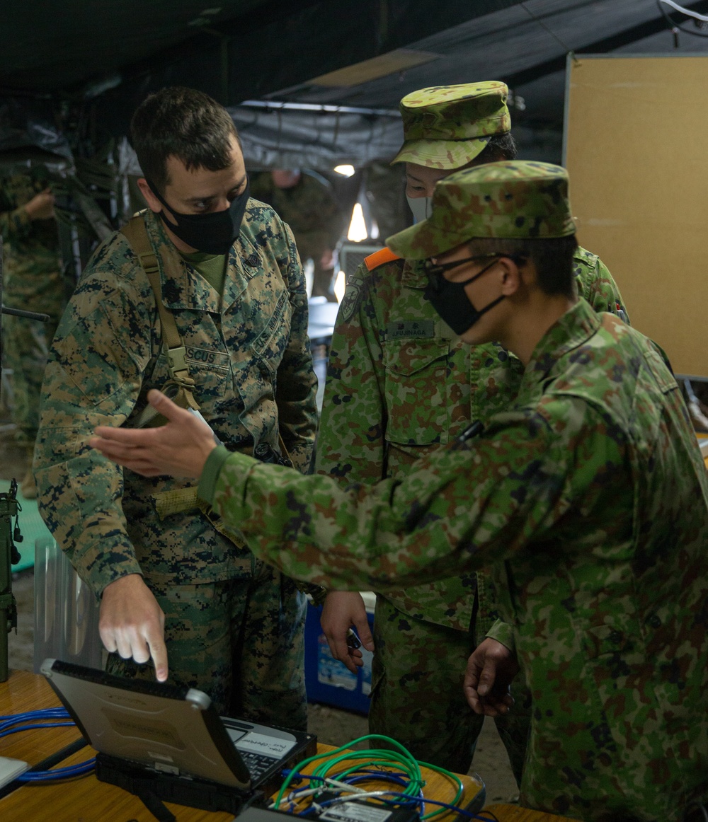 Marines with 3/8 and JGSDF Personnel operate network communications during Forest Light 21
