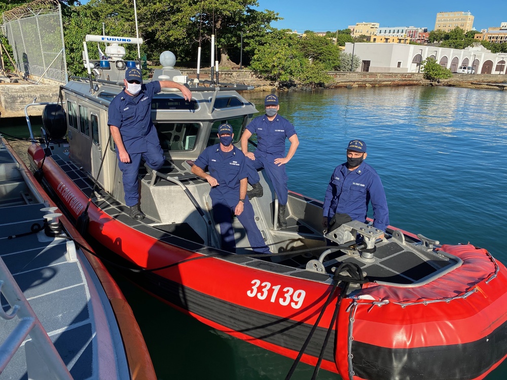 Coast Guard, Puerto Rico Emergency crews rescue 3 persons from capsized watercraft just off &quot;Isla de Cabras&quot; in Toa Baja, Puerto Rico