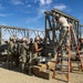 Seabees with NMCB-5 assemble a Mabey Johnson bridge