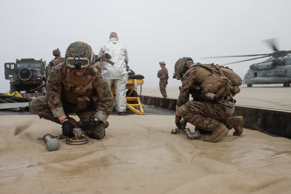 15th MEU Marines refuel CH-53E Super Stallions during FARP