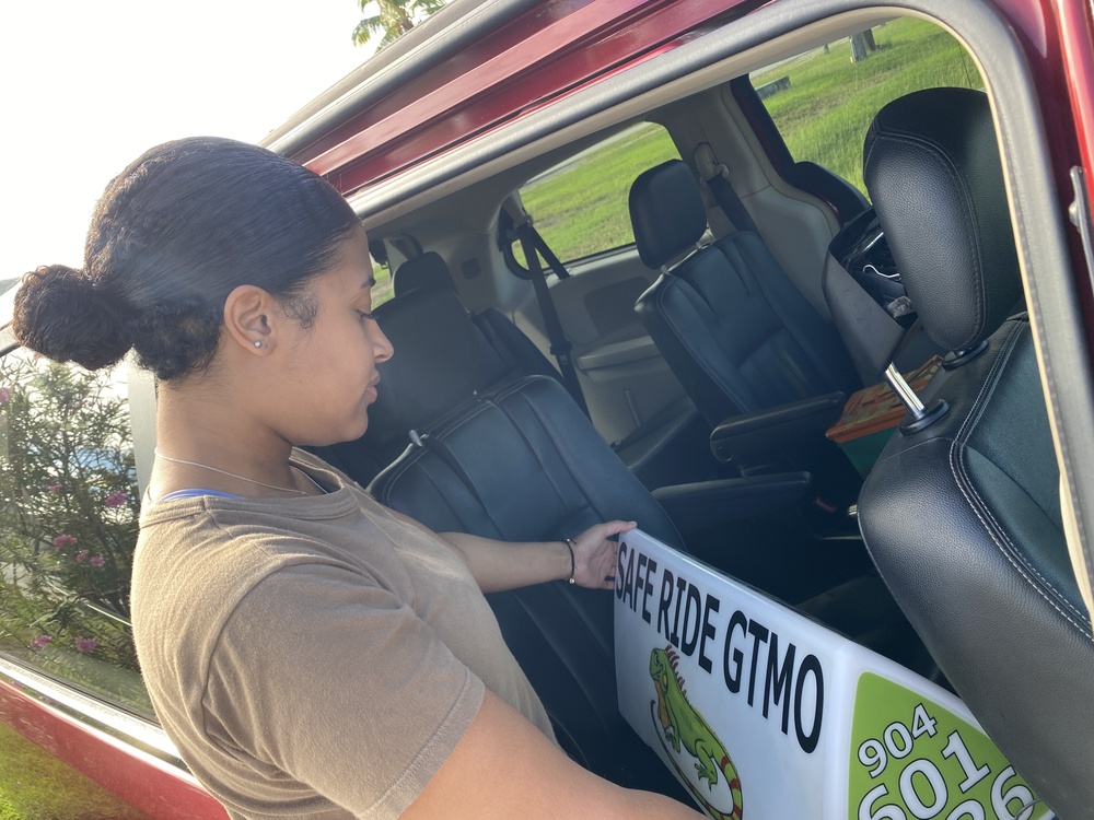 Guantanmo Bay Volunteers Help Residents Ride Safely