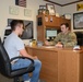 Fillip talks with Staff Sgt. East