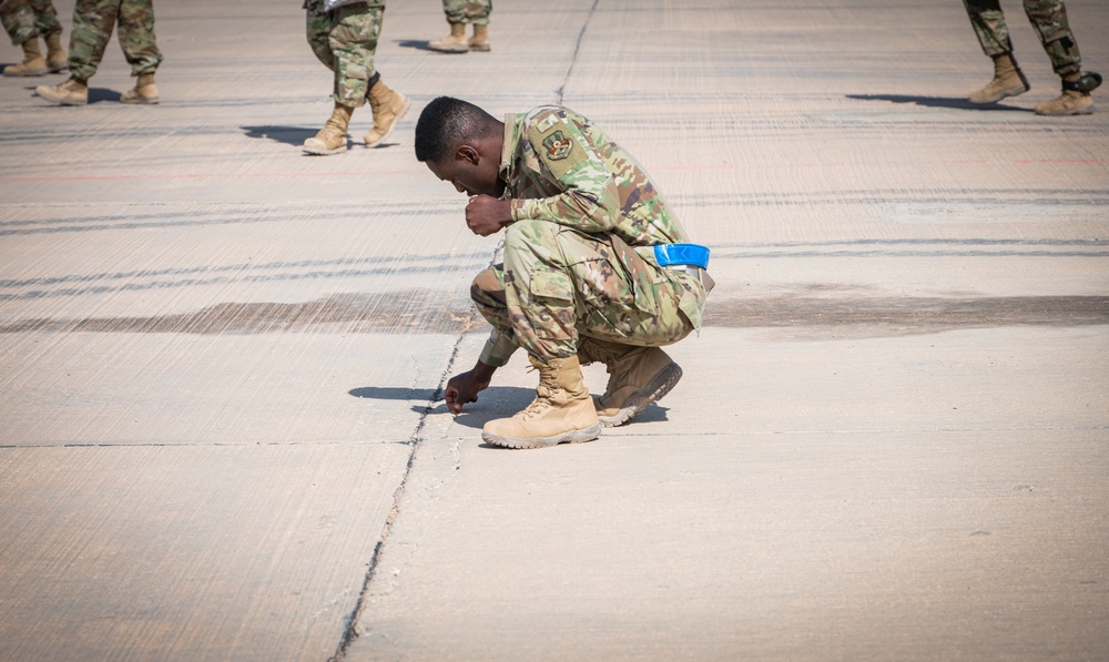 Airmen protect USAF, RSAF assets through FOD walk