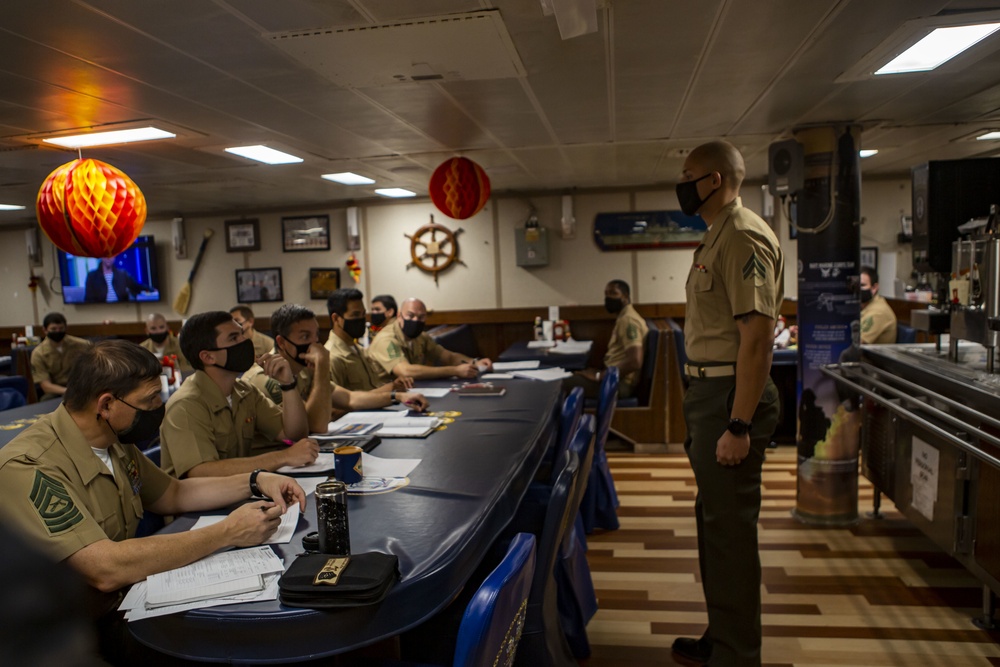 15th MEU Marines stand in NCO promotion panel