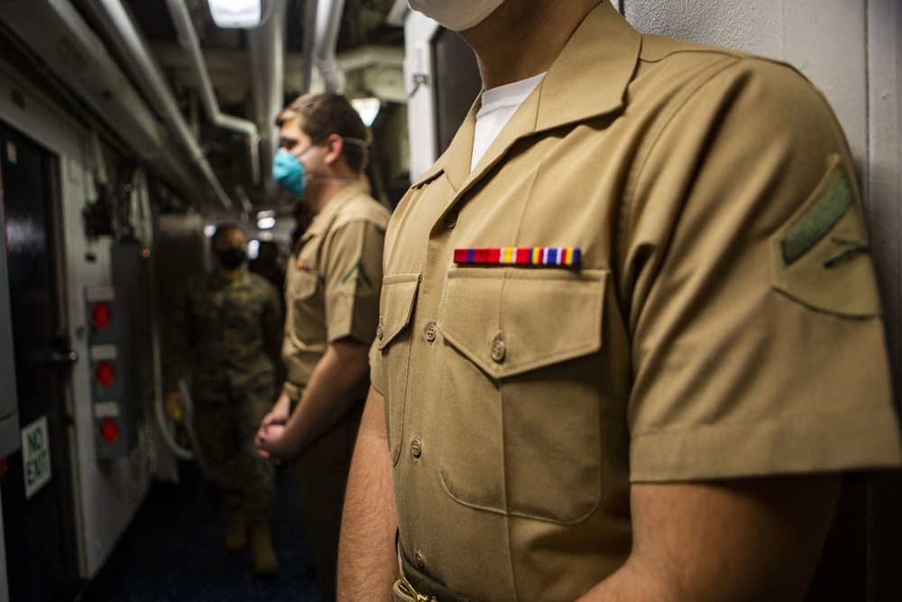 15th MEU Marines stand in NCO promotion panel