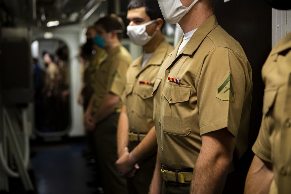 15th MEU Marines stand in NCO promotion panel