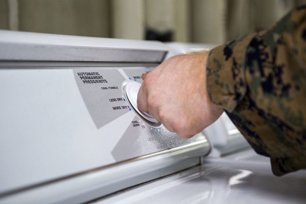 15th MEU Marines aboard USS Makin Island clean laundry