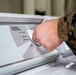 15th MEU Marines aboard USS Makin Island clean laundry