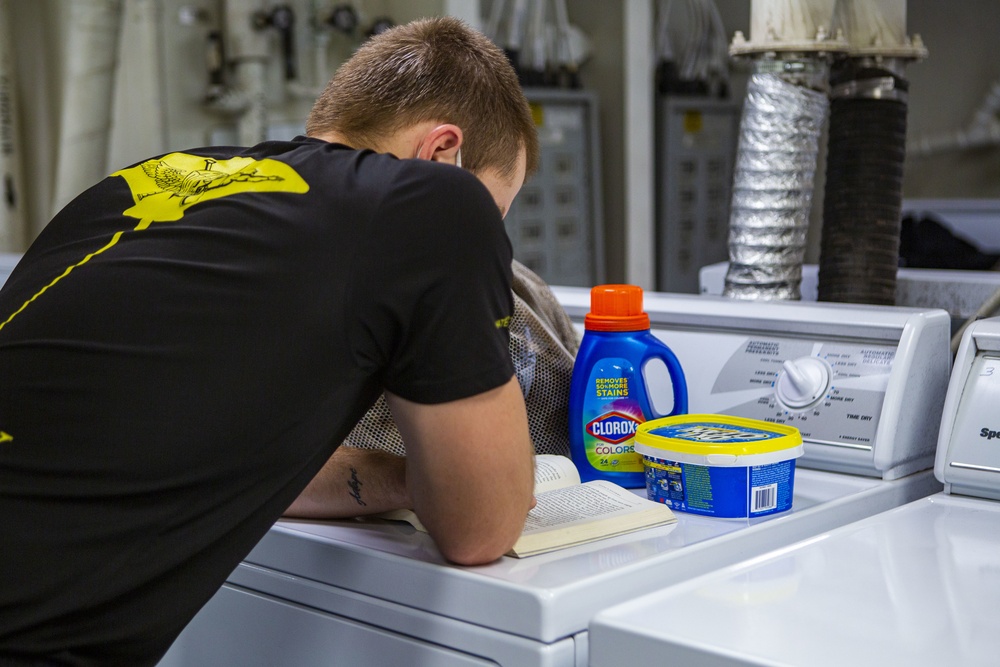 15th MEU Marines aboard USS Makin Island clean laundry