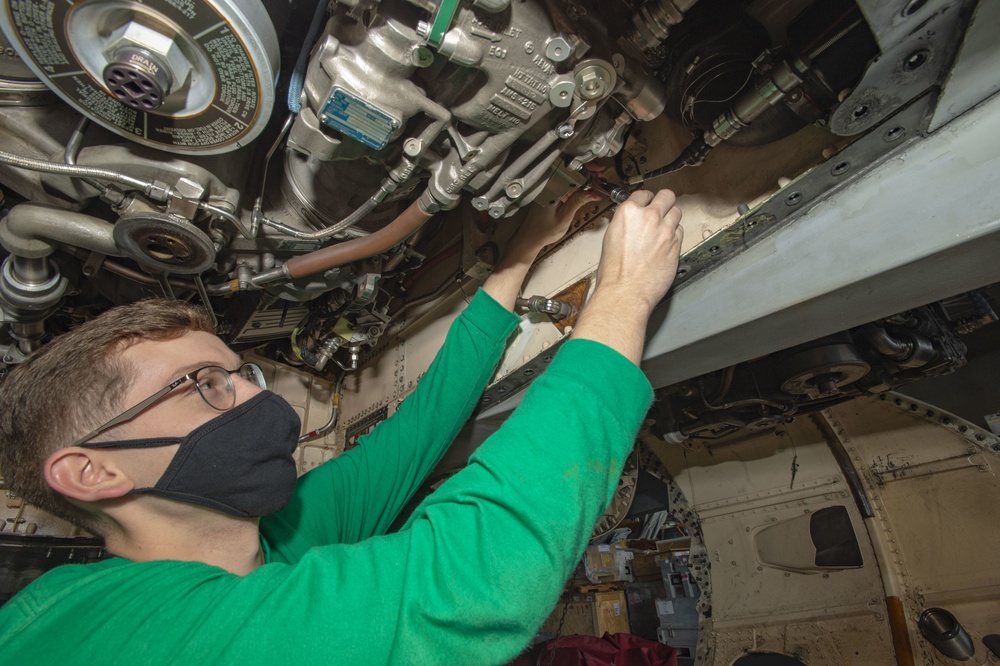 Sailor Performs Maintenance