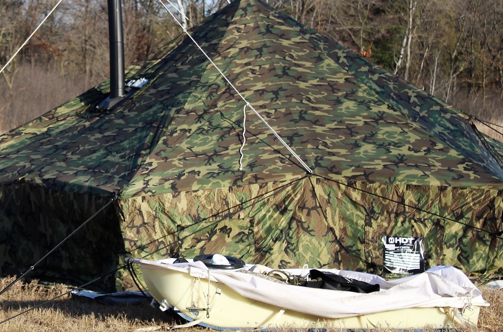 CWOC Class 21-01 students set up Arctic tents during field training at Fort McCoy