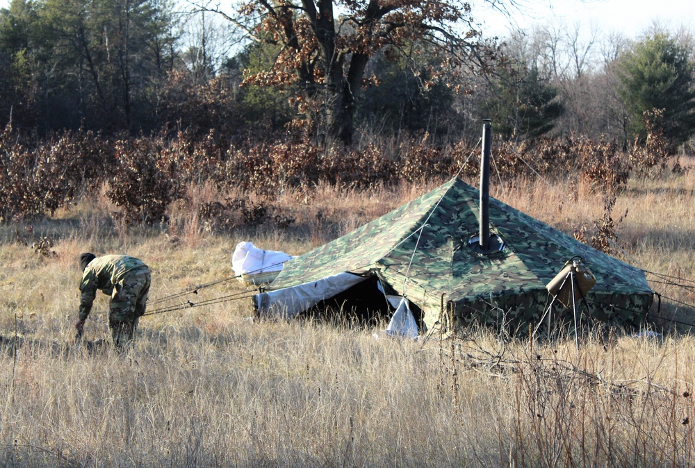 CWOC Class 21-01 students set up Arctic tents during field training at Fort McCoy