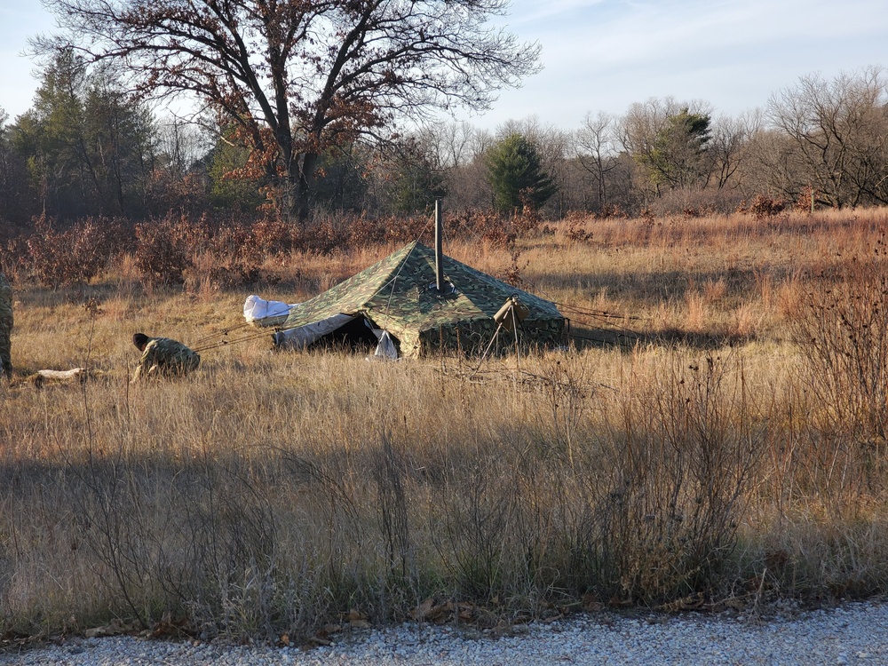 CWOC Class 21-01 students set up Arctic tents during field training at Fort McCoy