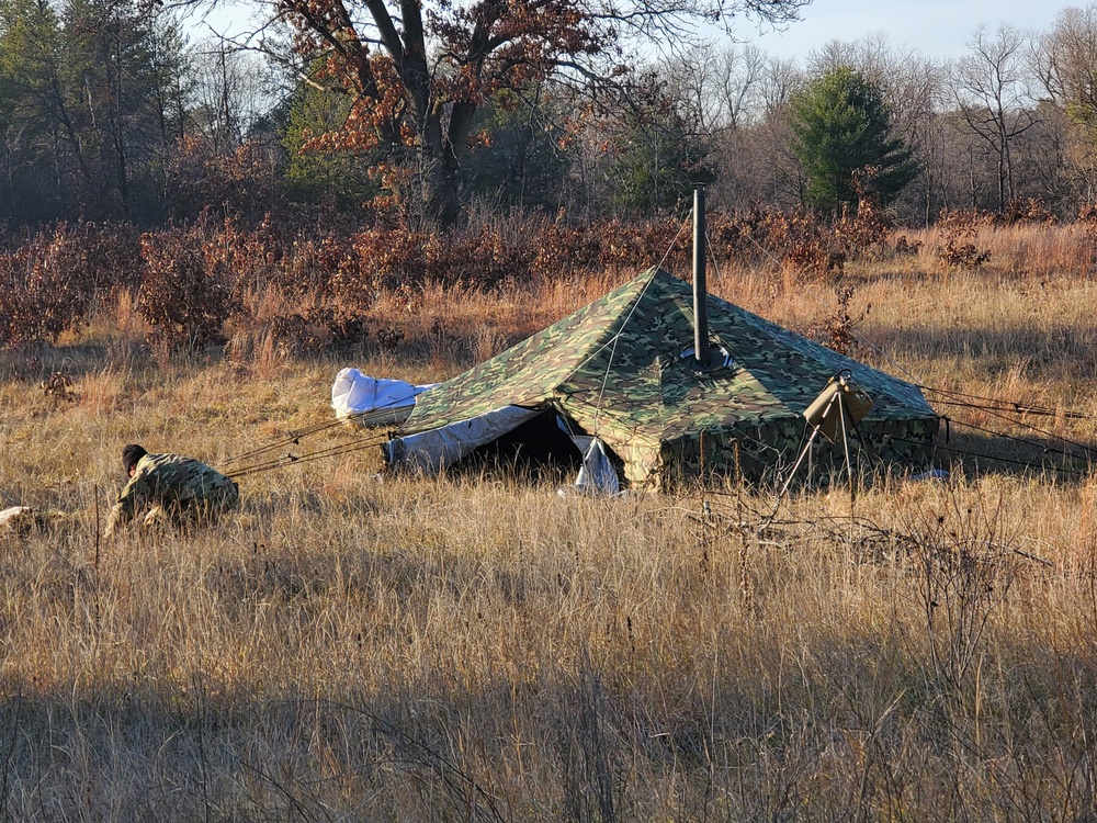 CWOC Class 21-01 students set up Arctic tents during field training at Fort McCoy