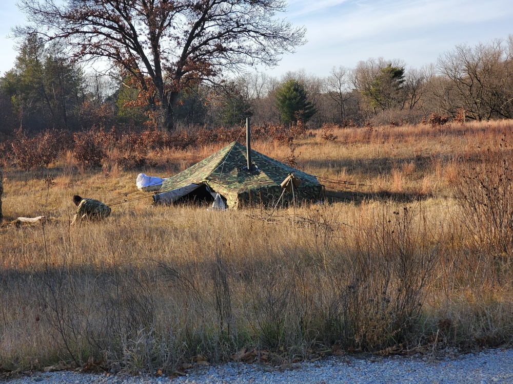 CWOC Class 21-01 students set up Arctic tents during field training at Fort McCoy