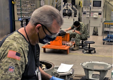 TRFB electrician works on motor