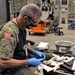 TRFB electrician works on motor