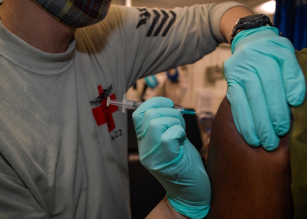 Hospital Corpsmen Administers Influenza Vaccine