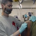 Hospital Corpsmen Administers Influenza Vaccine